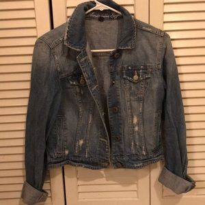 Distressed denim jacket